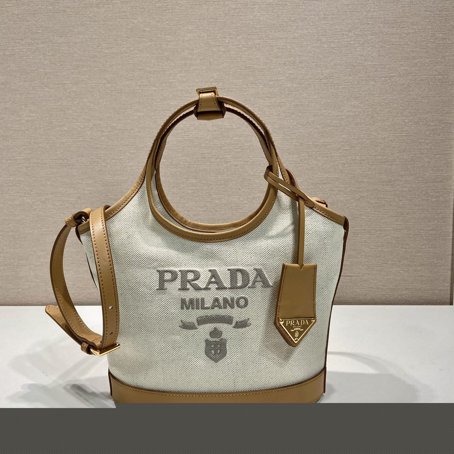 Pra*a top handle bags